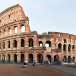 Roman Colosseum at dusk, showcasing its grandeur and historical significance