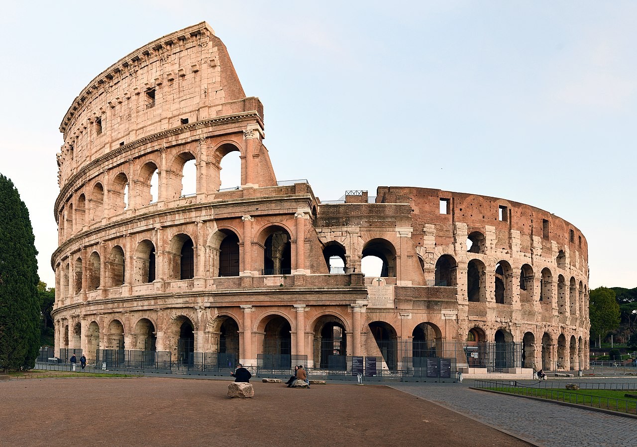 Roman Colosseum at dusk, showcasing its grandeur and historical significance