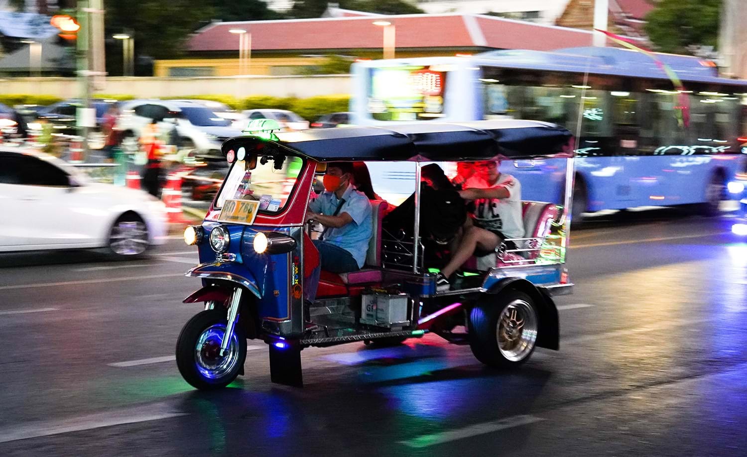 City street in Thailand with tuk tuks