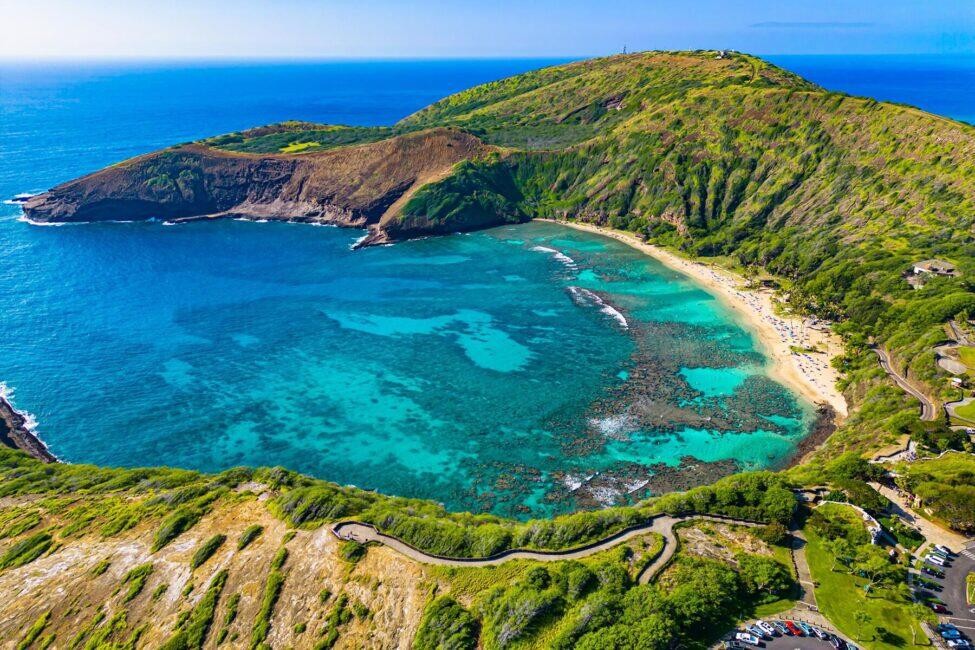 Hanauma Bay, a popular snorkeling spot in Oahu, requiring reservations to manage visitor impact