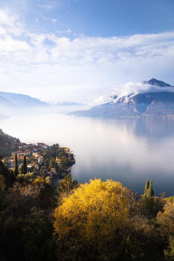 Balcony view overlooking Lake Como, Italy, emphasizing the scenic beauty and affordable accommodations available during the off-season
