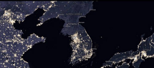 North Korean citizens walking under the watchful eyes of state propaganda, showcasing the pervasive control over daily life and movement within the country.