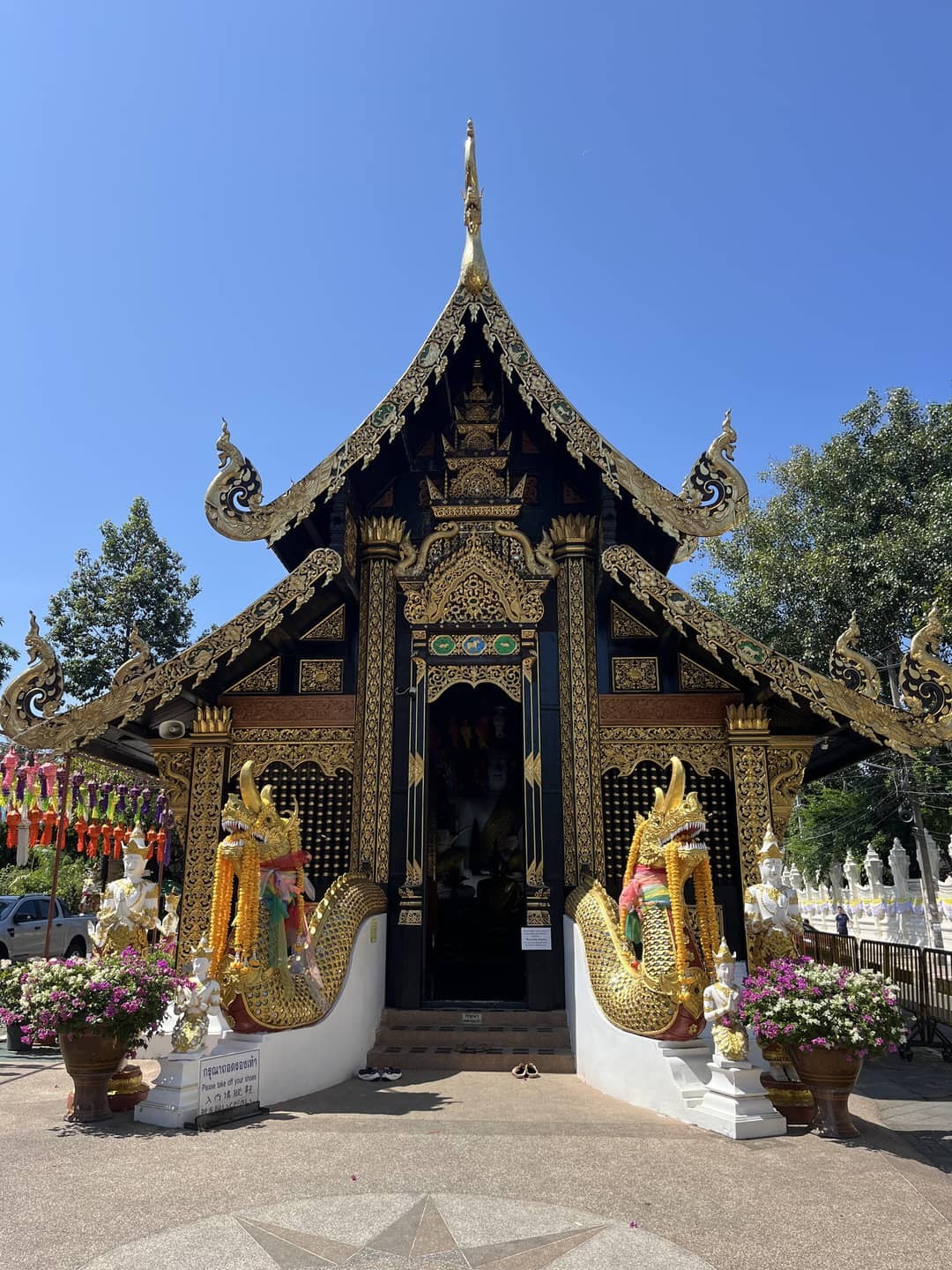 Woman admiring temple in Chiang Mai