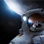 Astronauts on spacewalk exploring outside ISS