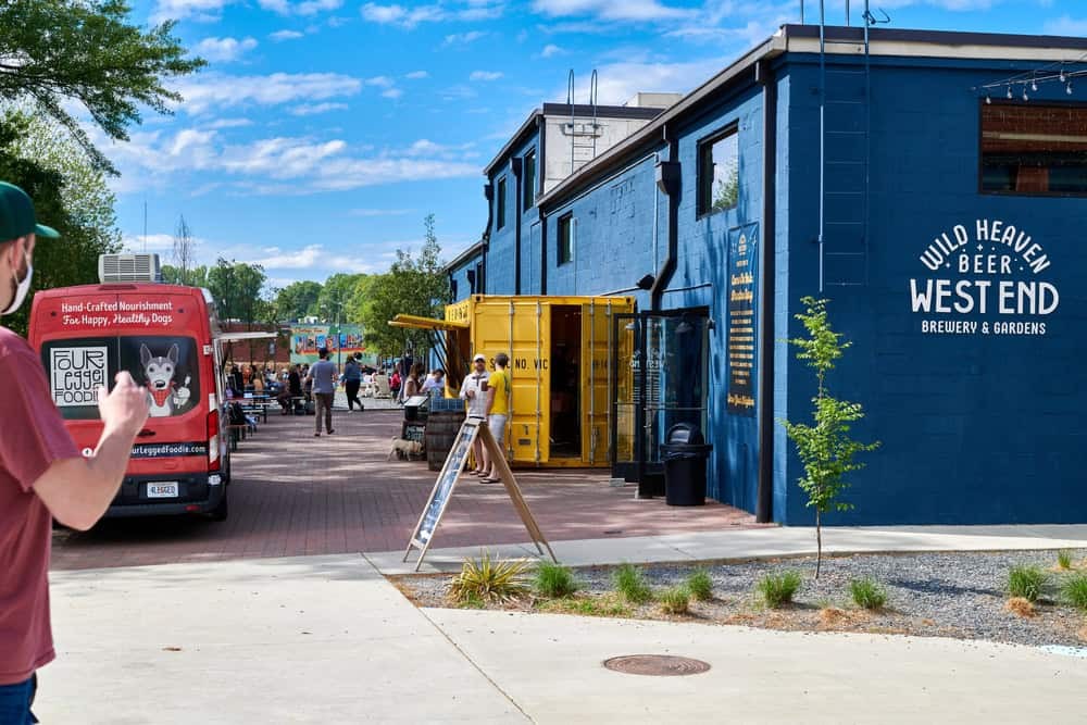 Atlanta city life, with blue skies and bustling activities.