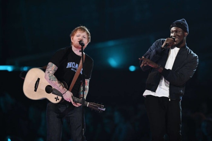 Ed Sheeran plays Take Me Back to London on stage