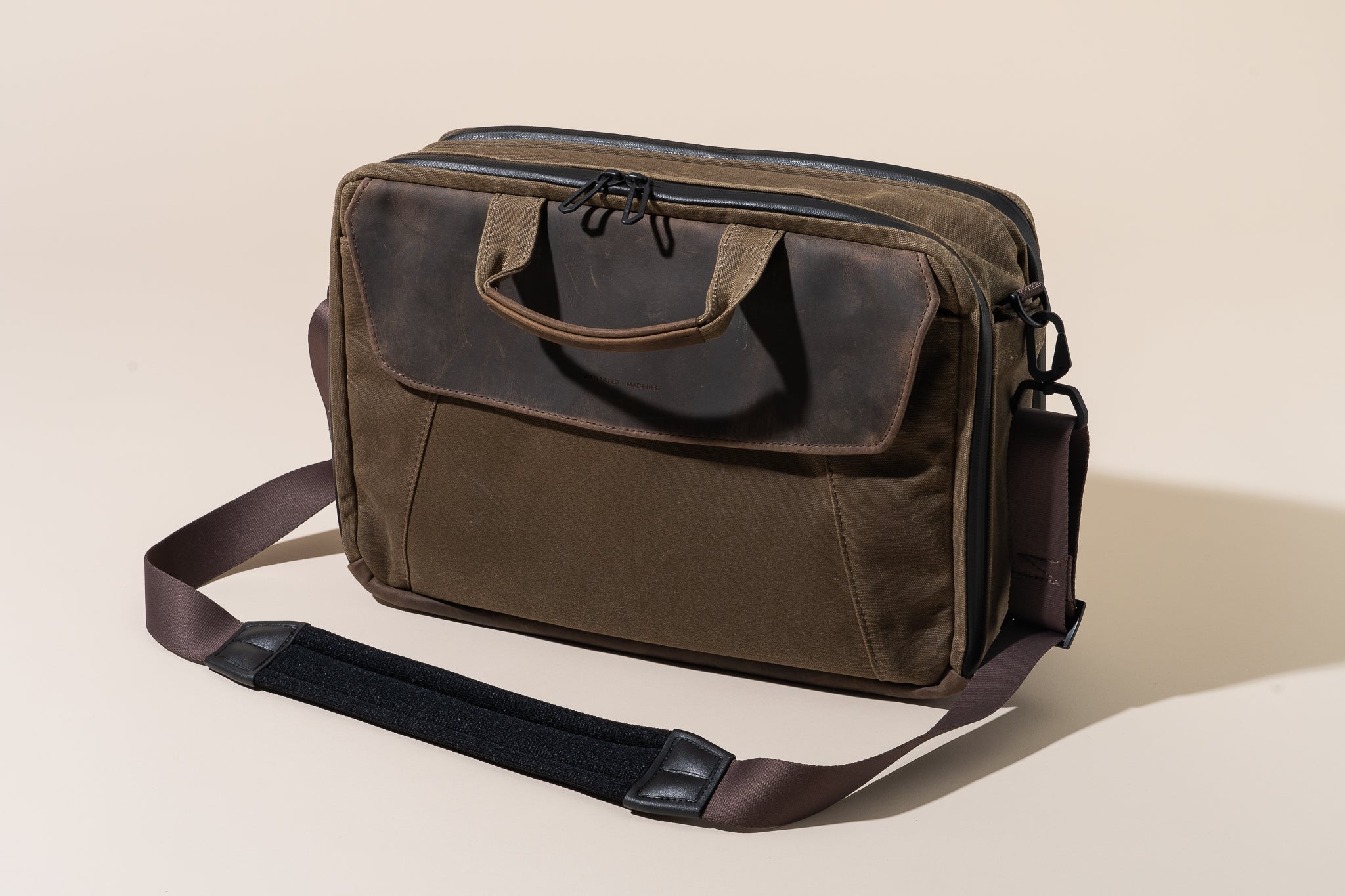 Photo of the Waterfield Air Porter Carry-On Bag on an off-white backdrop