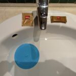 Blue universal plug with two kinds of soap