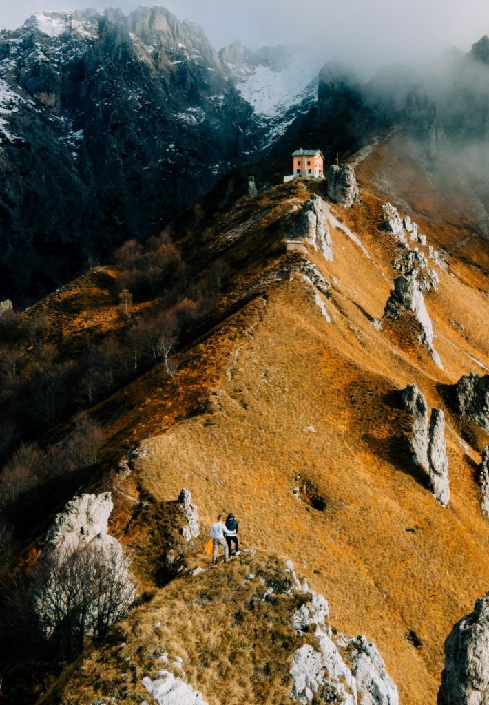 Landscape shot of Cinque Terre, Italy, highlighting the free activity of hiking and exploring the natural beauty of the Italian coastline