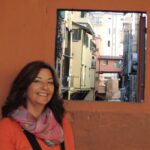 Ilene in Bologna wearing stylish, practical travel clothes