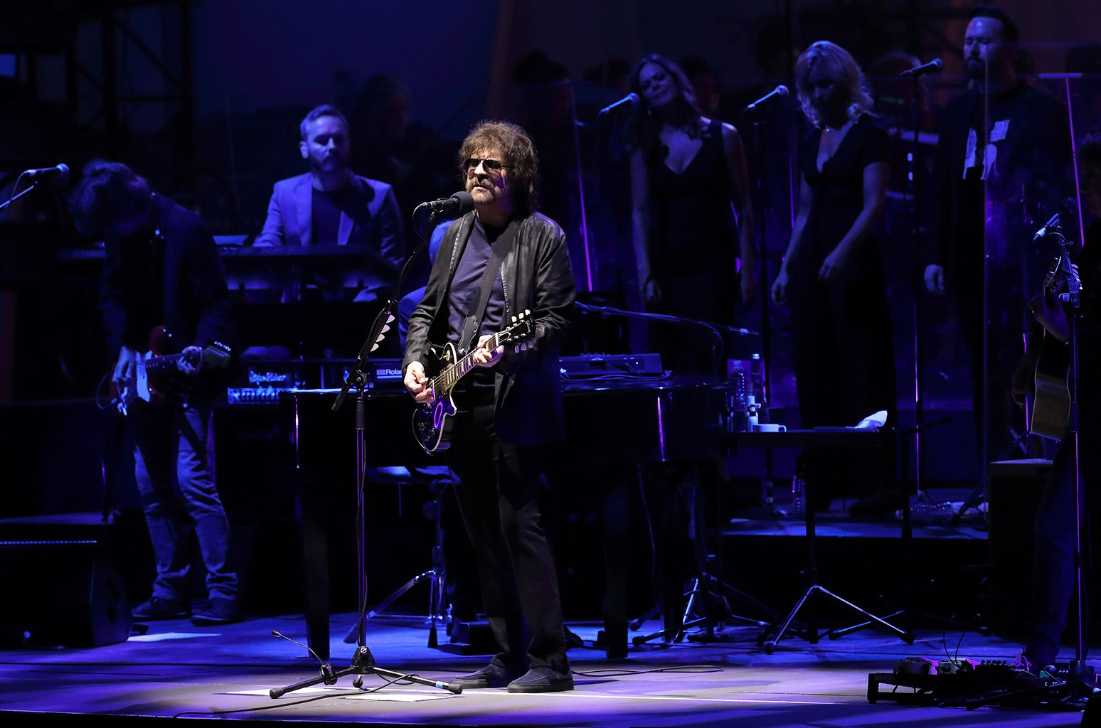 Jeff Lynne performing with ELO, showcasing his continued musical endeavors and legacy