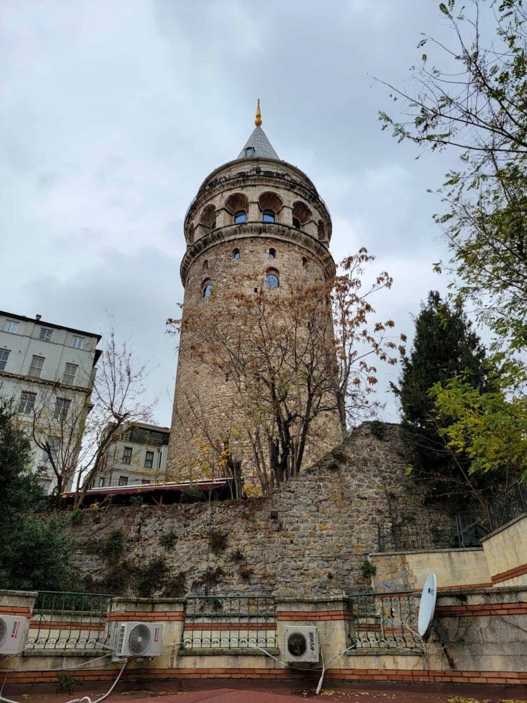 A woman enjoying the panoramic view of Istanbul from the Galata Tower