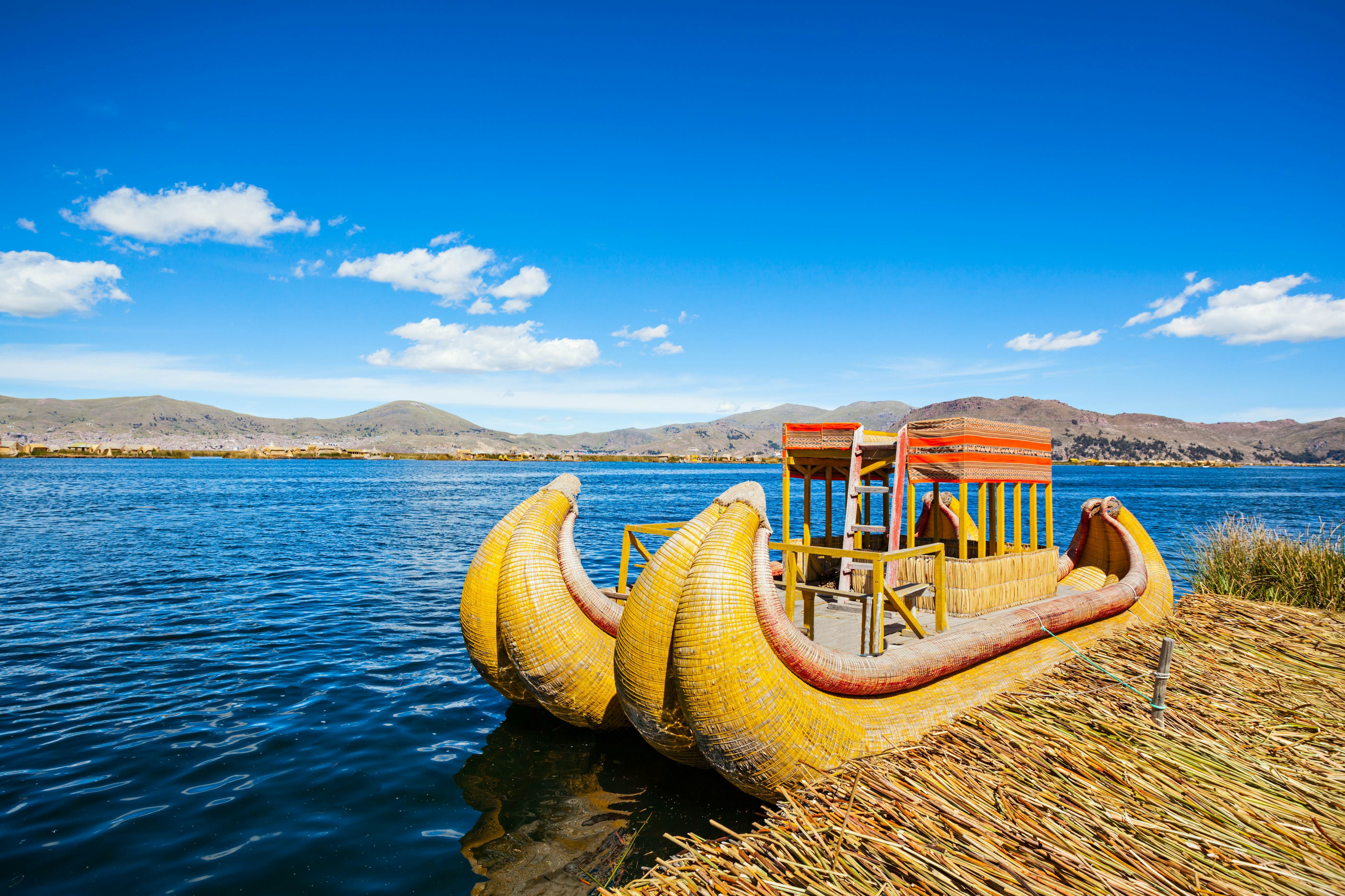 Totora boat on Lake Titicaca in Peru, highlighting the traditional craftsmanship and cultural significance of the floating islands.