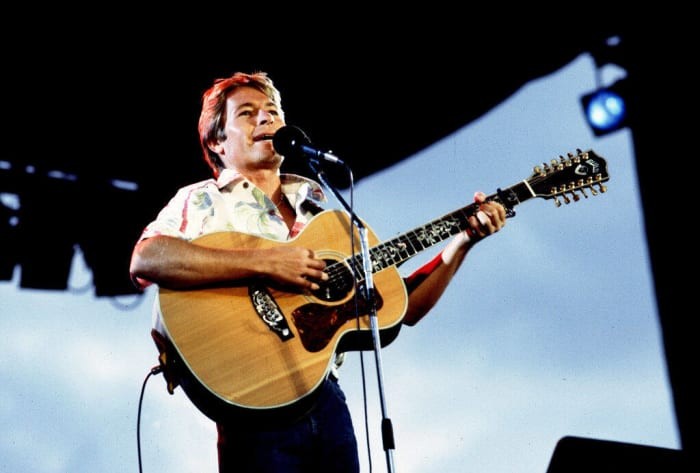 John Denver plays Take Me Home, Country Roads at a concert