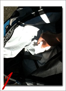 Vacuuming the Inside of a Travel Backpack to Remove Dirt