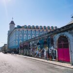 Lisbon street with traditional tiles and architecture, showcasing the city's charm