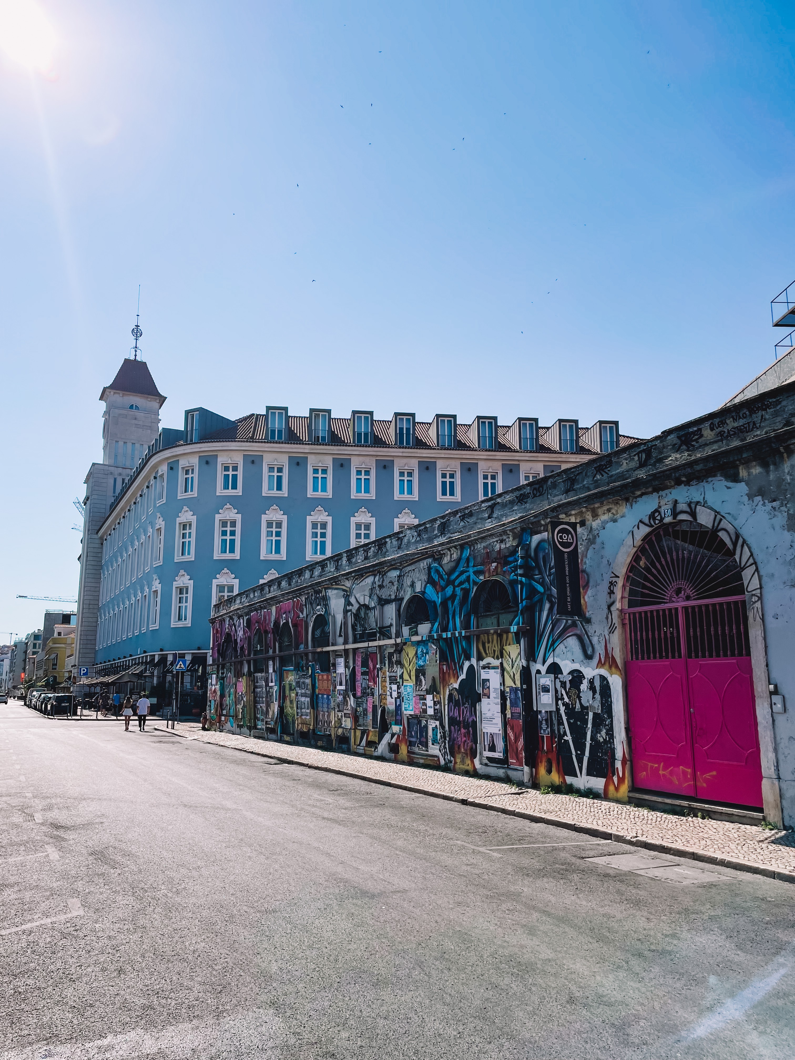 Lisbon street with traditional tiles and architecture, showcasing the city's charm