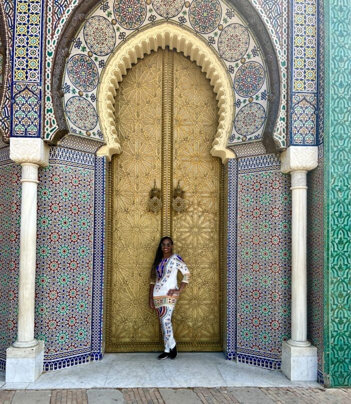 Fes Palace Doors intricate craftsmanship, featuring geometric patterns and detailed metalwork.