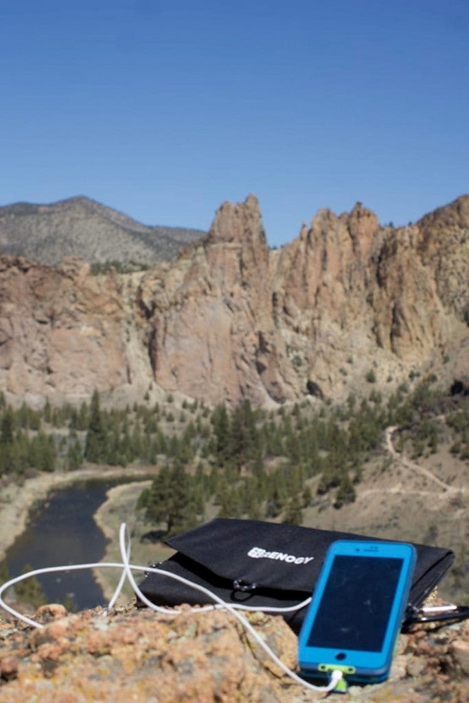 Cell phone charging on a rock