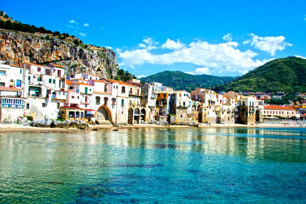 Coast of Cefalu, Palermo Sicily Italy. The seas around Sicily are warm enough for swimming in October.