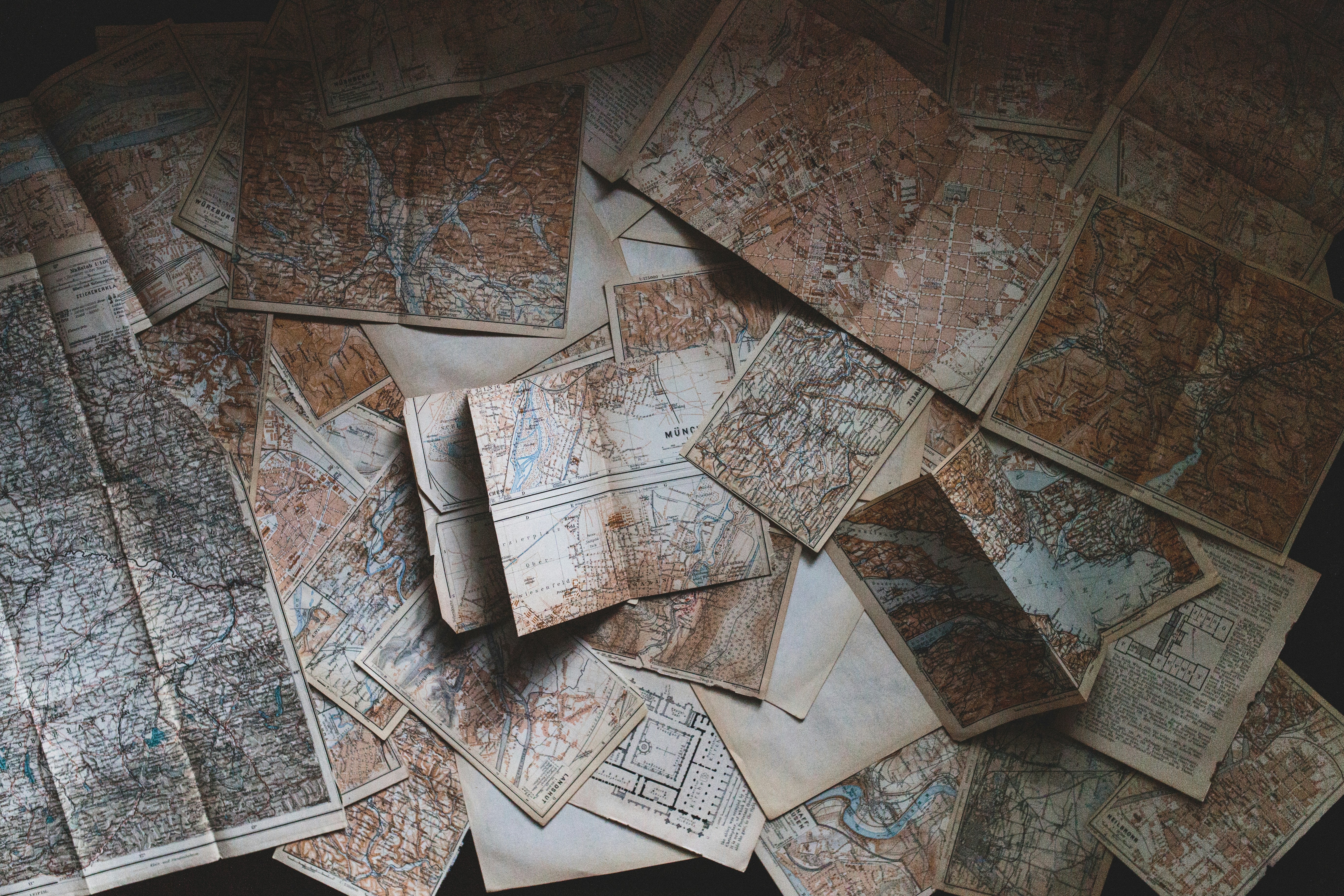 Maps Lying on the floor. A birds eye view of maps lying on the floor.
