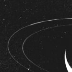 Voyager 2 image of Neptune and Triton, showcasing the blue planet with its largest moon. Alt text: Neptune and Triton as seen by Voyager 2