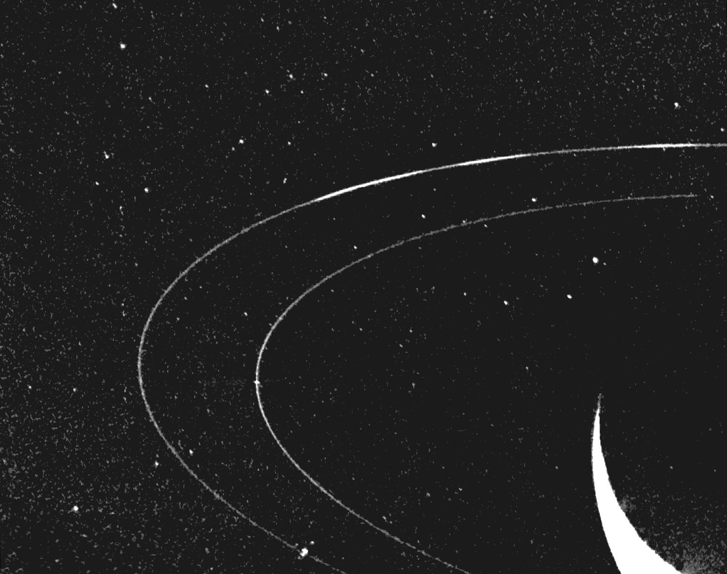 Voyager 2 image of Neptune and Triton, showcasing the blue planet with its largest moon. Alt text: Neptune and Triton as seen by Voyager 2