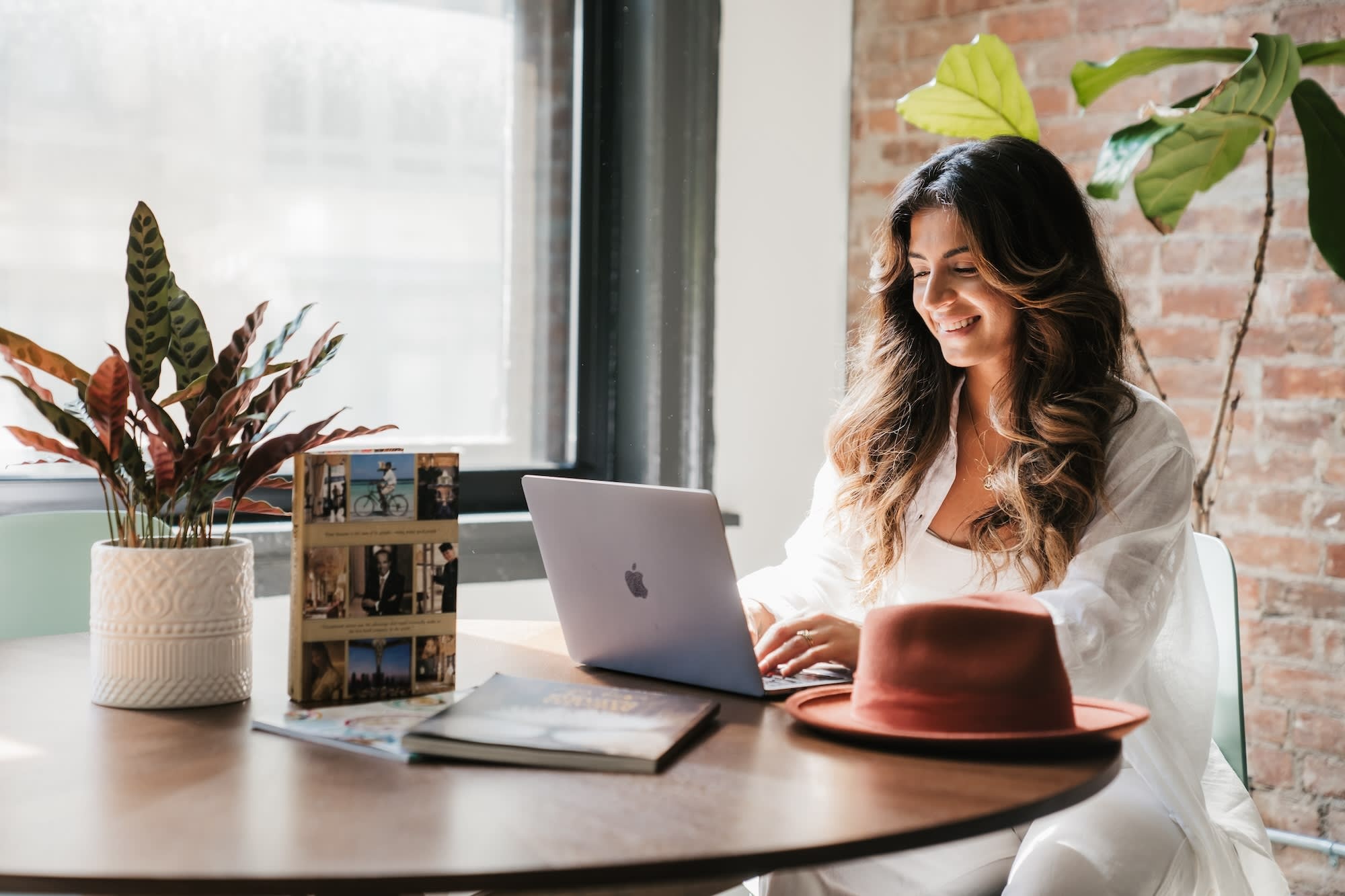 Fora Advisor Swaylah Faroqi works from Fora HQ, showcasing the potential for remote work within the travel industry