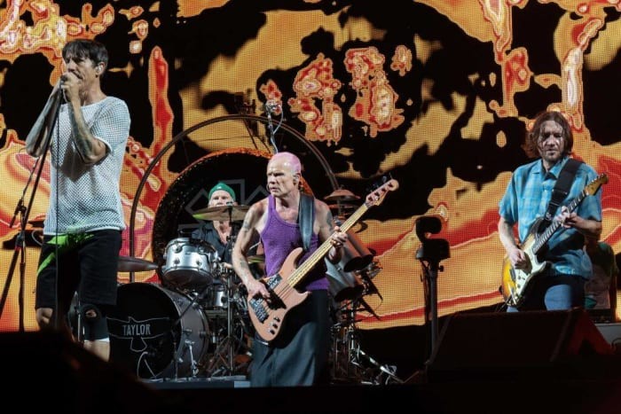 Red Hot Chili Peppers perform Road Trippin' at a concert