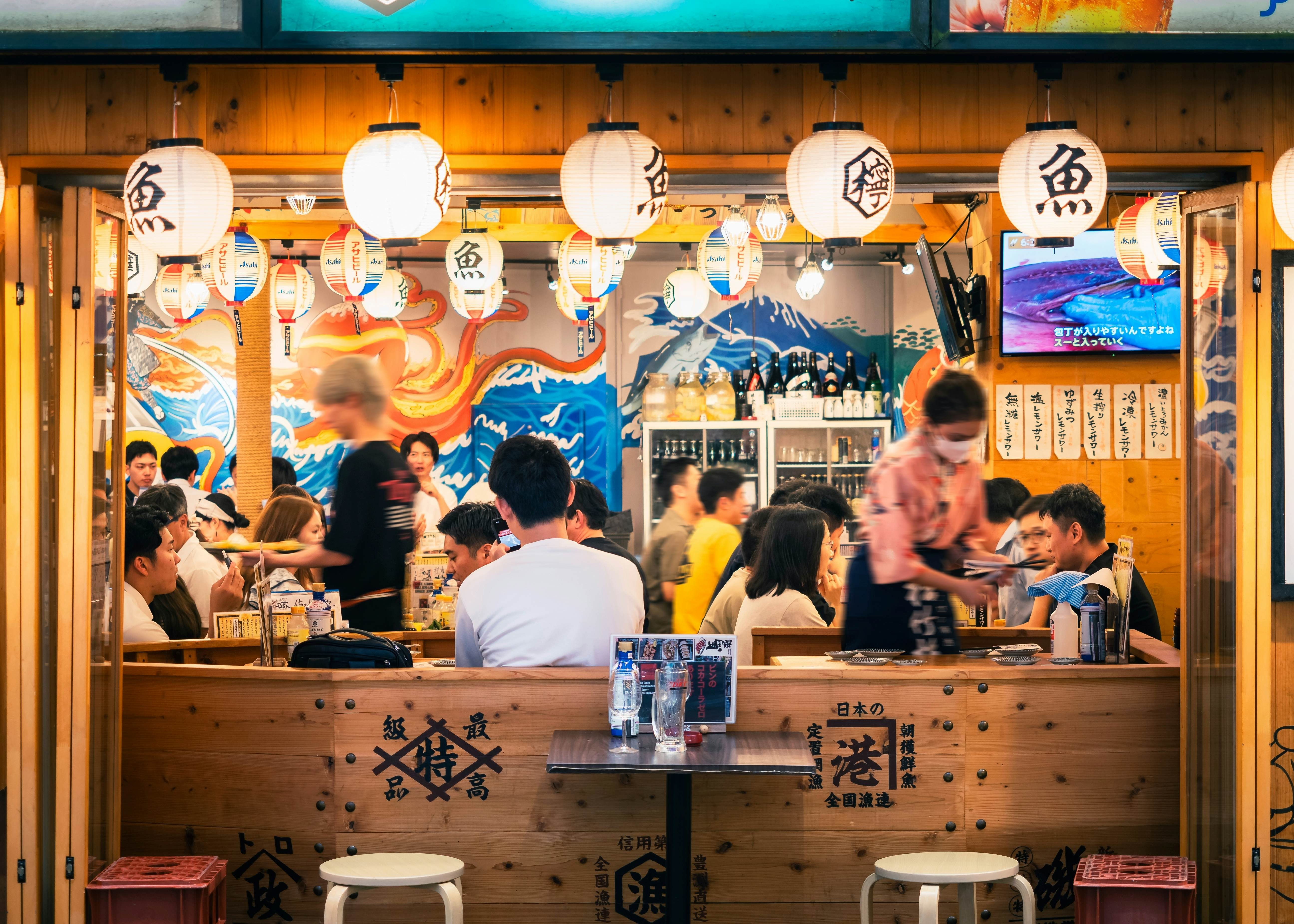 A small restaurant in Yokohama, Japan. The image highlights the Japanese dining culture and customs.