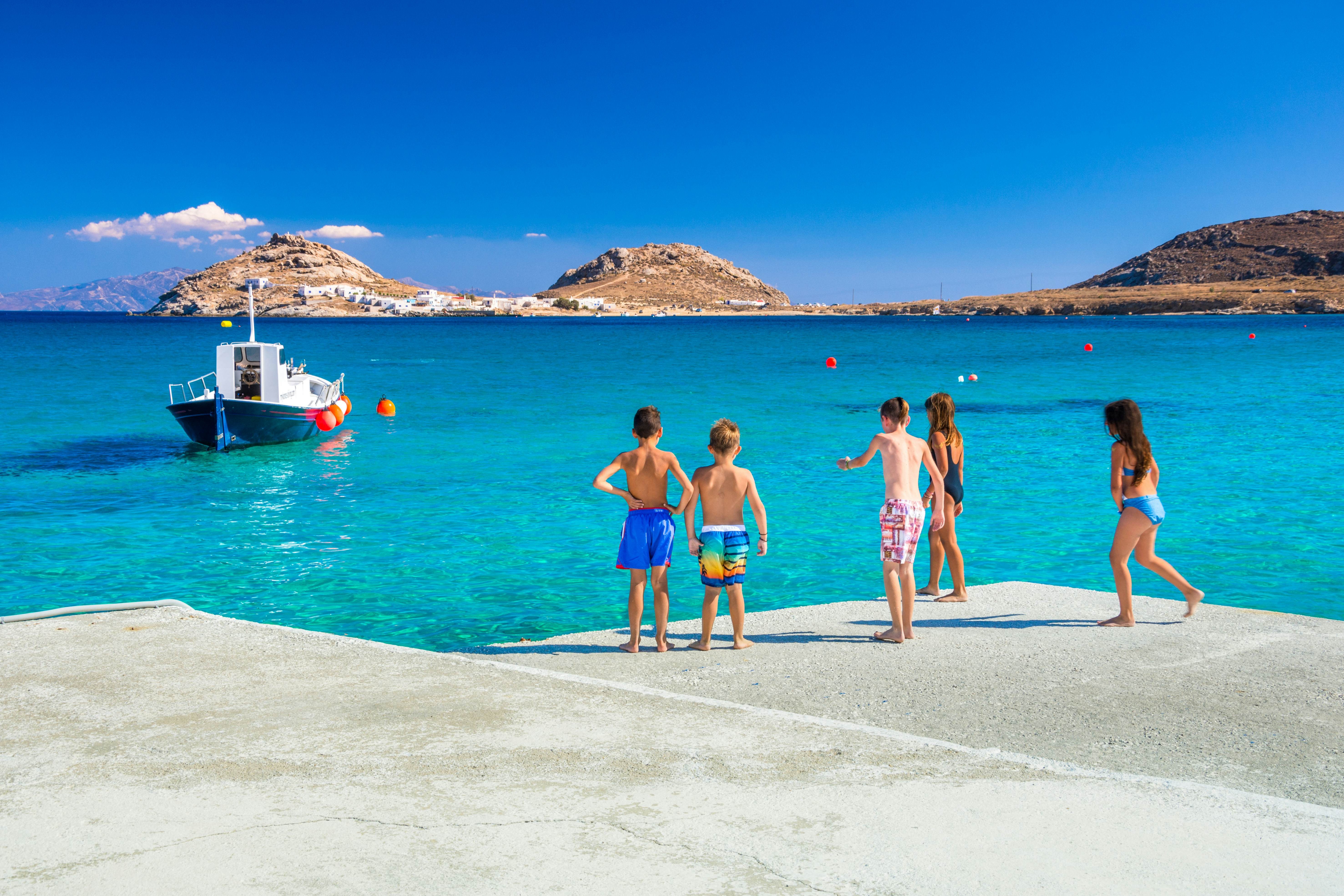 Greek ferry approaching a picturesque island port