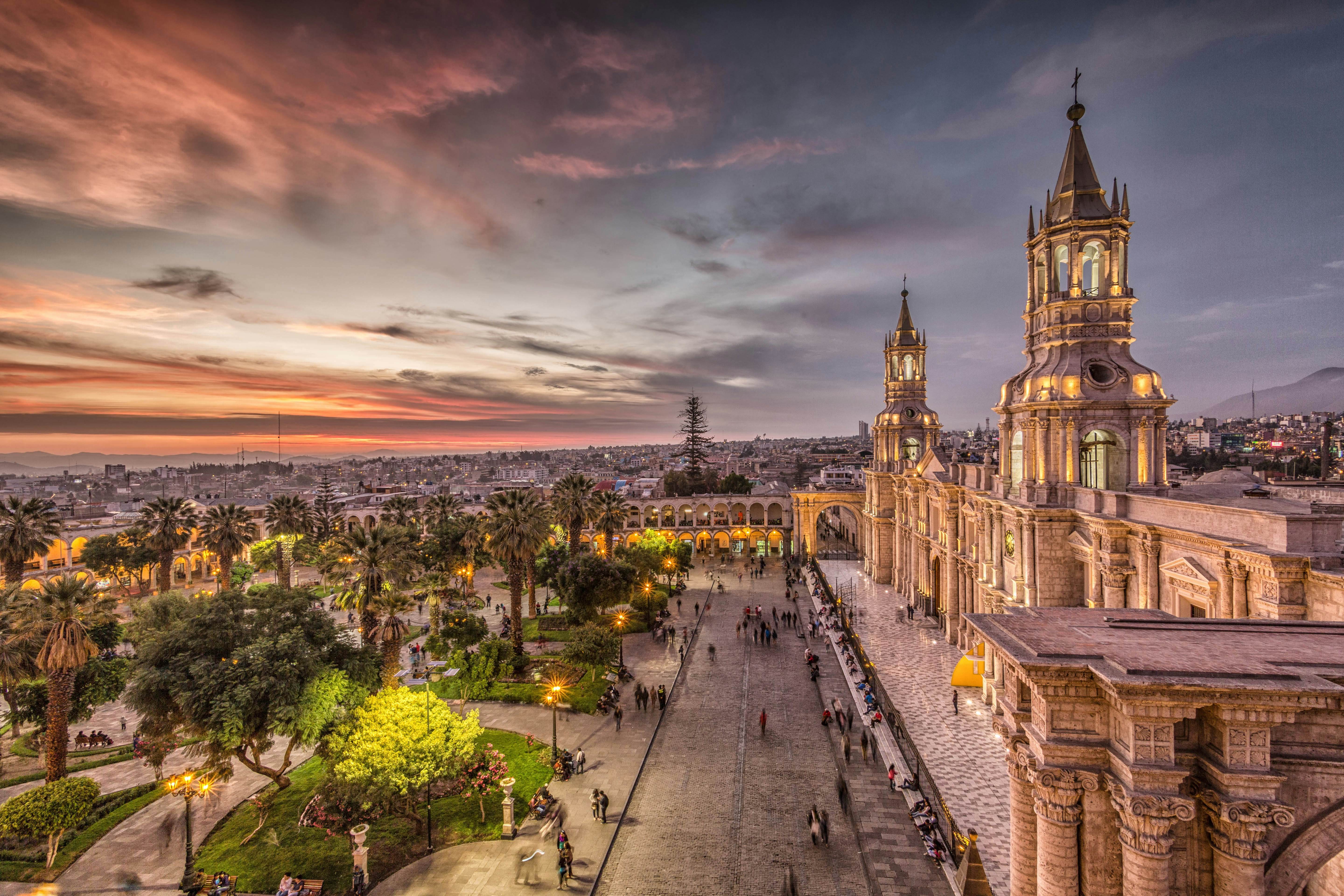 Sunset over the Plaza de Armas in Arequipa, Peru, showcasing the city's stunning colonial architecture.