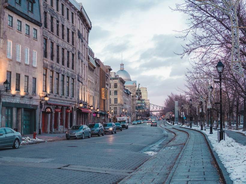 Cobblestone street in Old Montreal with historic buildings