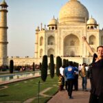 Candace Rardon posing at the Taj Mahal in India