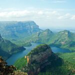 Drakensberg Mountains, South Africa. The dramatic mountain range with its distinctive peaks and valleys, under a clear blue sky