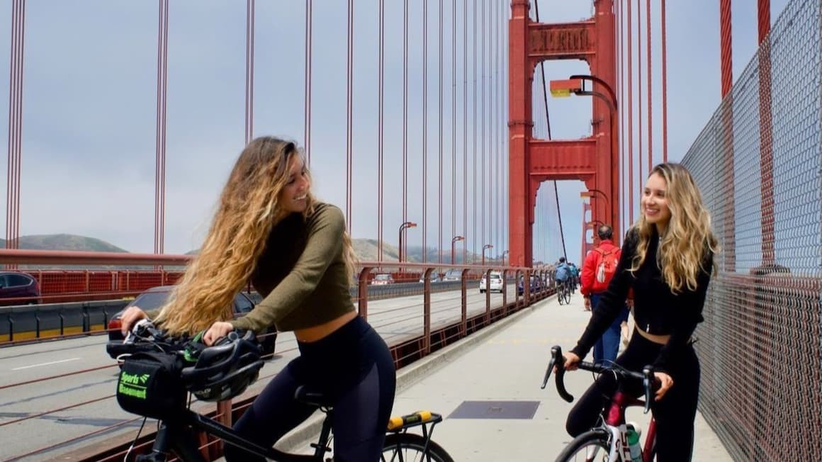 Two cyclists enjoying a ride across the Golden Gate Bridge