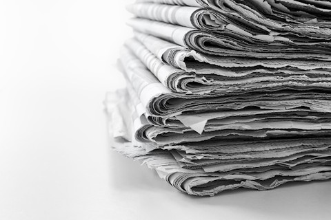 Pile of newspapers waiting to be used